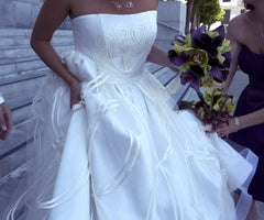 Jorge Manuel 
Tulle 
Ball gown
A-line
Ivory
Strapless
Wedding Dress
Front close