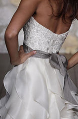 Jim Hjelm
ivory
silk satin
organza
white sash
sweetheart