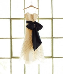 BHLDN Ivory Tiered Tulip Wedding Gown Hanging