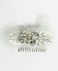 Lenora Veil
Hair piece
Swarovski Crystal
Pearl
Tulle
Hushed Commotion
Product Shot